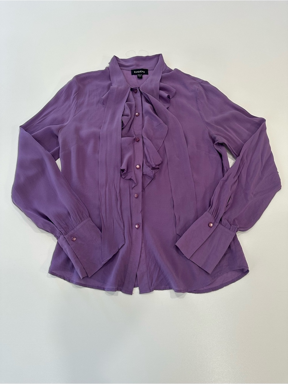 bebe Purple long-sleeved blouse with a neck bow and front ruffles Silk Sz L